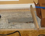Living room floor. Flatten around heater vents Flatten around heater vents. I created a jig to locate high spots. I would mark the high spots and then use a masonry wheel on my angle grinder to level the...