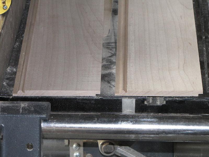 IMG_7343.JPG - The original plan called for plywood for the back.  I decided to resaw slats, put a bead on the edge to disguise the expansion gap, and ship lap the joint.  